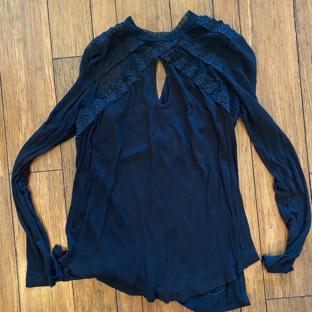 Black top with open and see through detailing